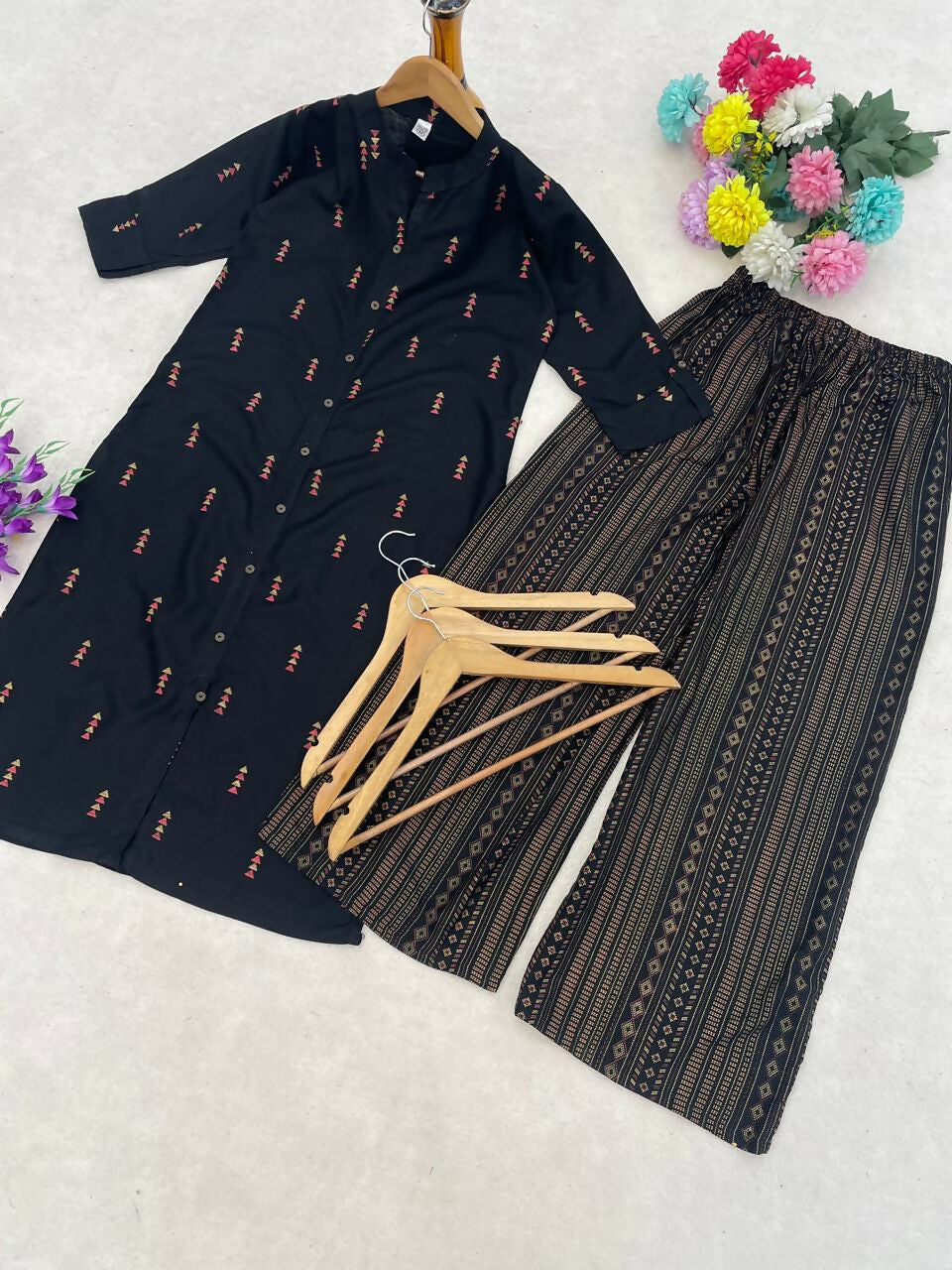 Teeya Creation Classic Black Cotton Kurta Set With Subtle Embroidery And Printed Palazzos | Grocsy