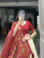 Lorenvalley Offwhite and Red Tussar Silk Patola Print Lehenga Choli | Grocsy