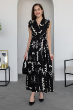 Pimu V-Neck Maxi Dress with Black Graphic Print | Grocsy