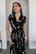 Pimu V-Neck Maxi Dress with Black Graphic Print | Grocsy