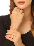 NVR Women Gold-Polished Adjustable Kada Bracelet | Grocsy