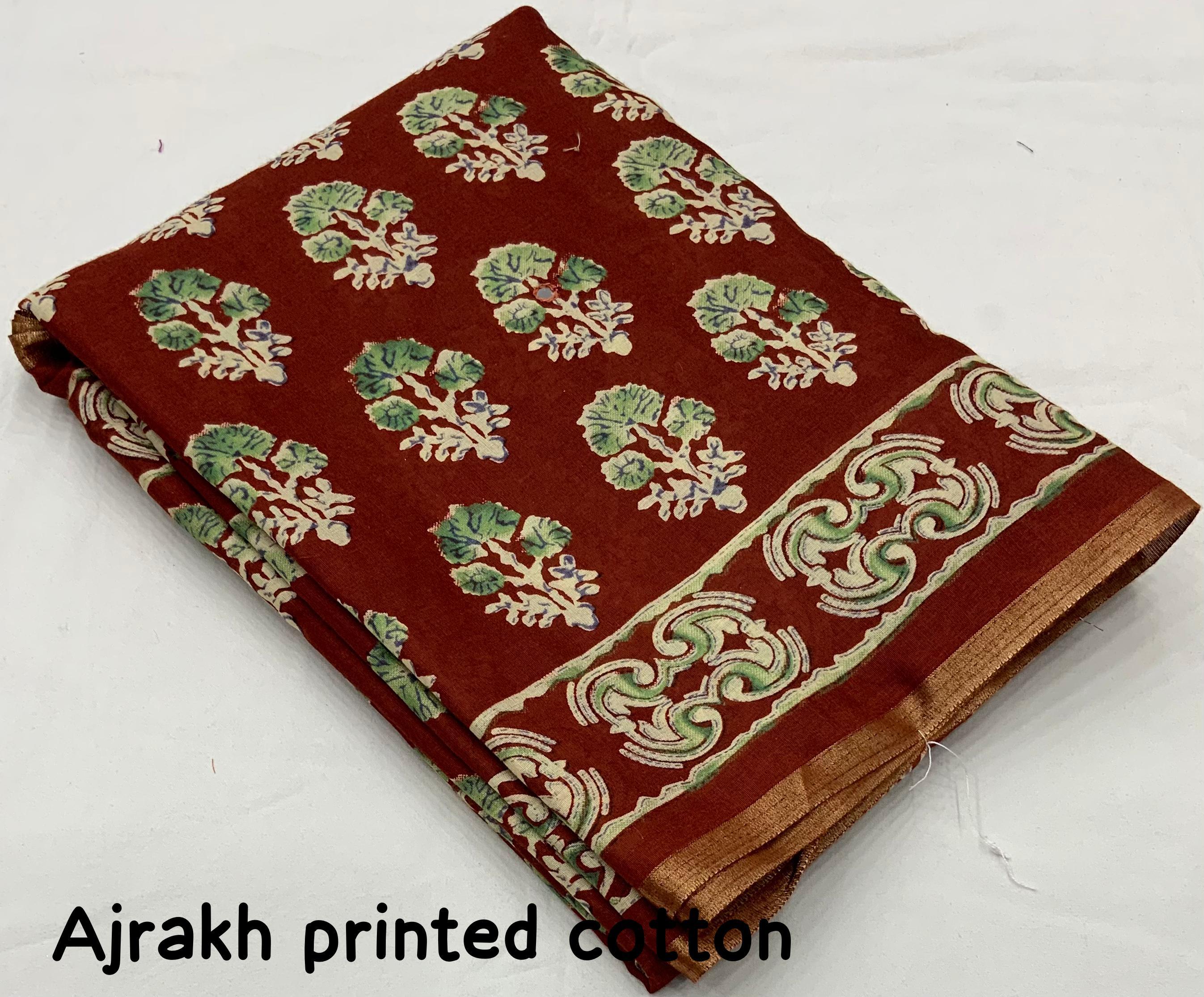 Red Cotton Blend Ajrak Saree with Unstitched Blouse - Hiral Fashion | Grocsy