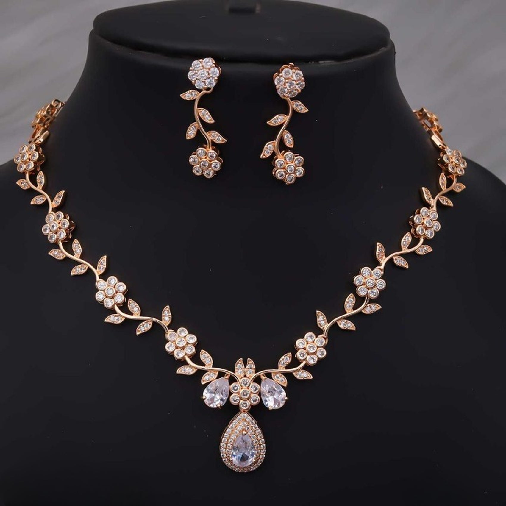 Jewel City Exquisite Rose Gold Plated White American Diamond Necklace Set | Grocsy