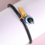 NVR Men & Women Black Evil Eye Crystal Spring Ring Bracelet | Grocsy