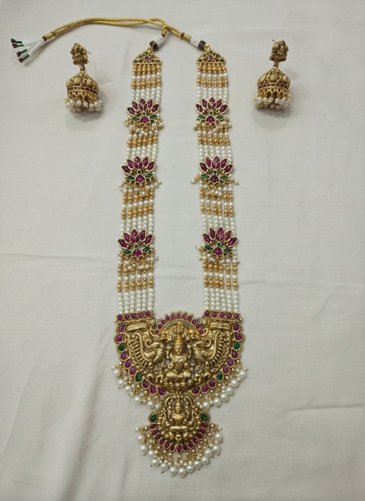 Jewel City Traditional Lakshmi Temple Long Haram Necklace Set for Women | Gold-Plated Pearl, Ruby & Green Stone Bridal Jewellery | Grocsy