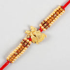 Krishna Designer Rakhi and Soan Papdi | Grocsy