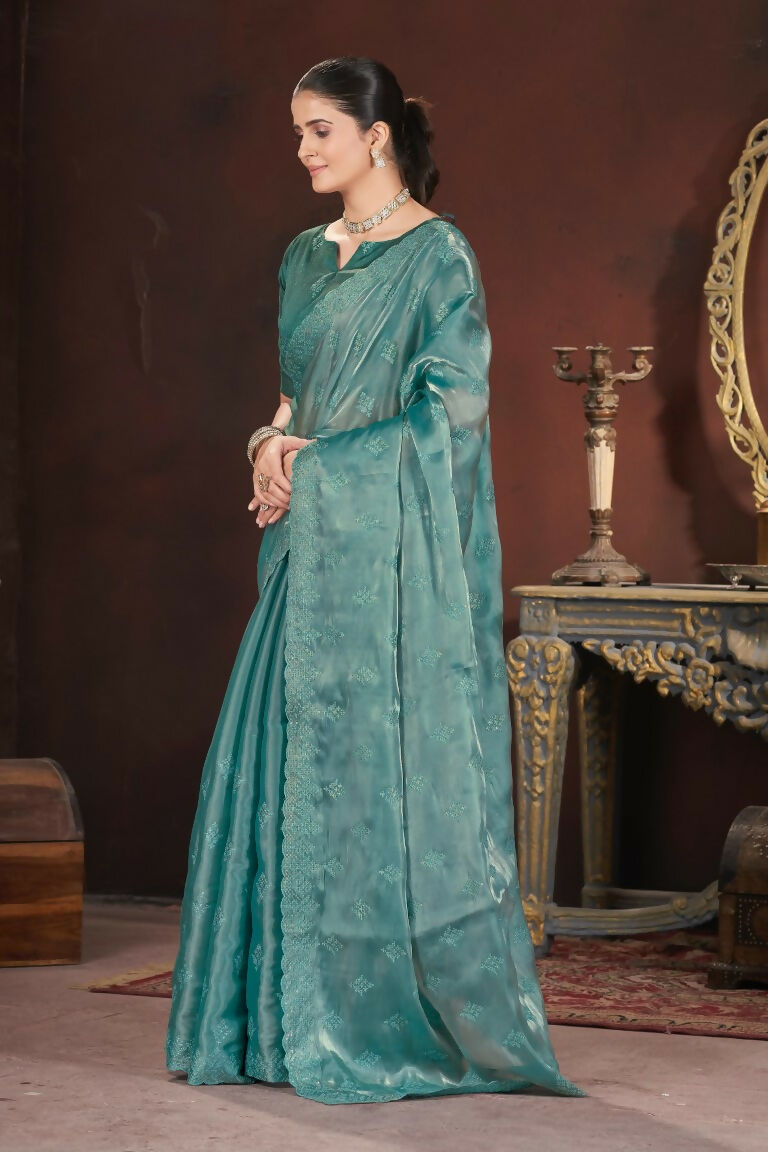 Vastranavya Teal Jimmy Choo Silk 3mm Sequence work with Cross Stitch Embroidery work & Cutwork Border Saree | Grocsy