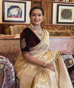 Evanik Cream Crush Tissue Silk Saree with Velvet Embroidery Stitched Blouse | Grocsy