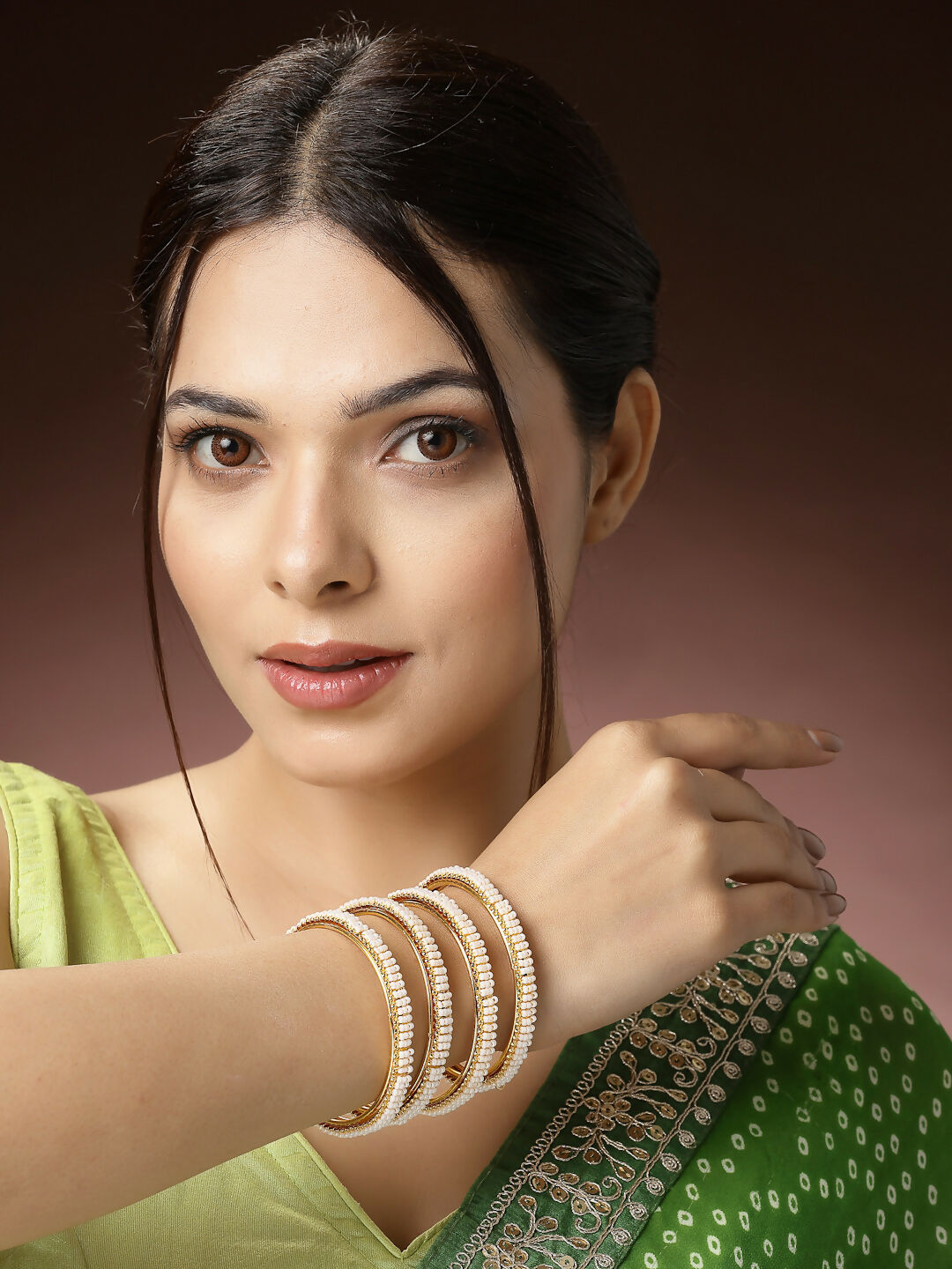 NVR Women's Set of 4 Gold-Polished Pearl Handcrafted Traditional Bangles | Grocsy