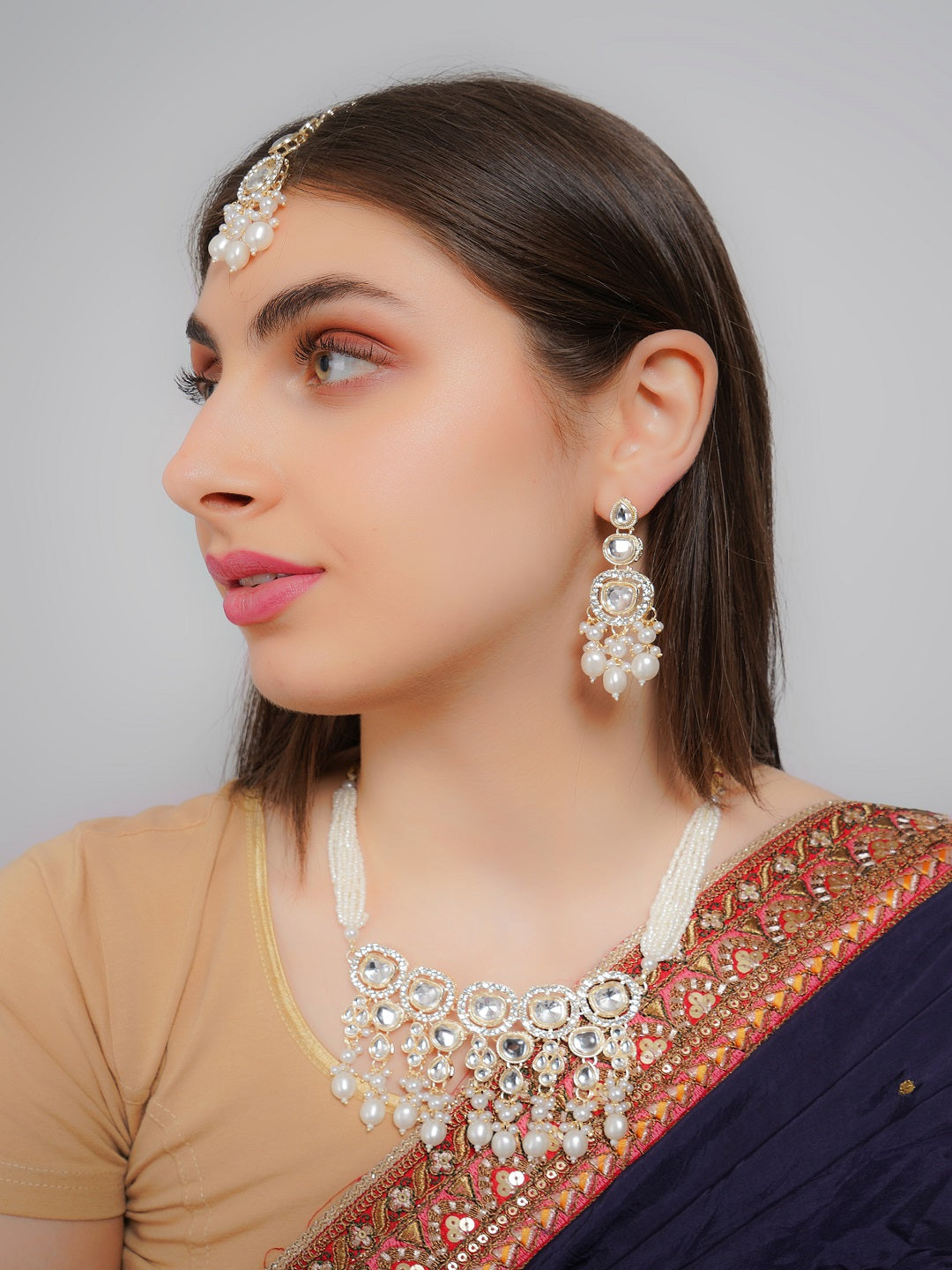 Divisha Alloy Gold-plated White Artificial Pearl Jewellery Set | Grocsy