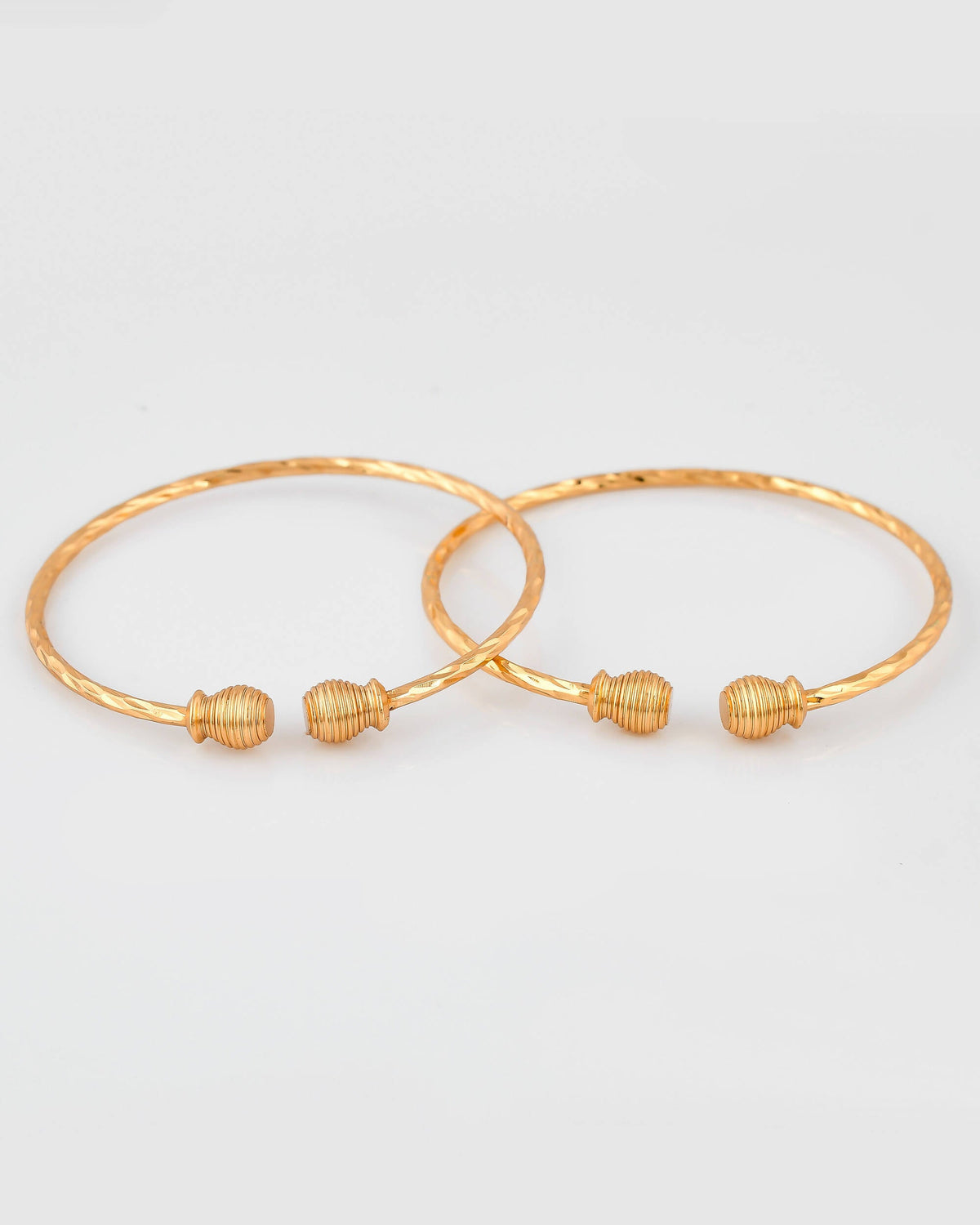 VOJ Stainless Steel Gold-Polished Bangle Set (Pack of 2) | Grocsy