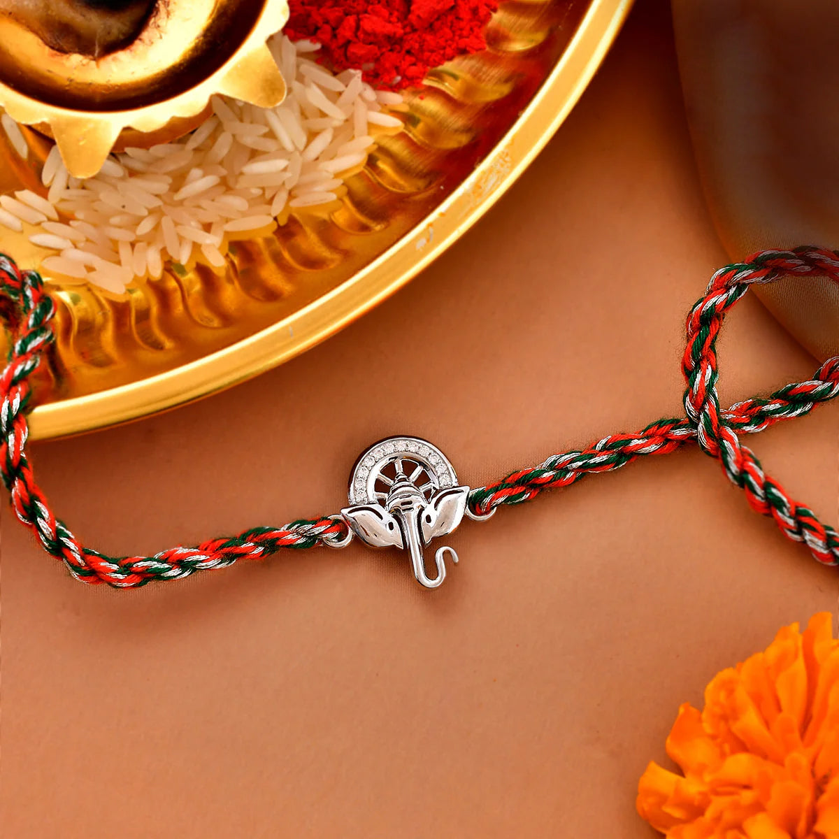 trueBrowns 925 Sterling Silver Auspicious Ganpati Thread Style Rakhi | Grocsy