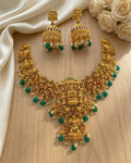 Jewel City Gold Temple Jewelry Set - Green Lakshmi Devi Necklace & Jhumka Earrings | Grocsy