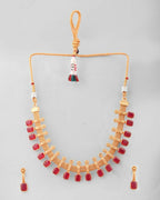VOJ Gold-Polished Traditional Maroon Stone Studded Necklace And Earrings Set | Grocsy