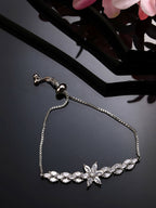 NVR Women Silver-Plated Handcrafted American Diamond Link Bracelet