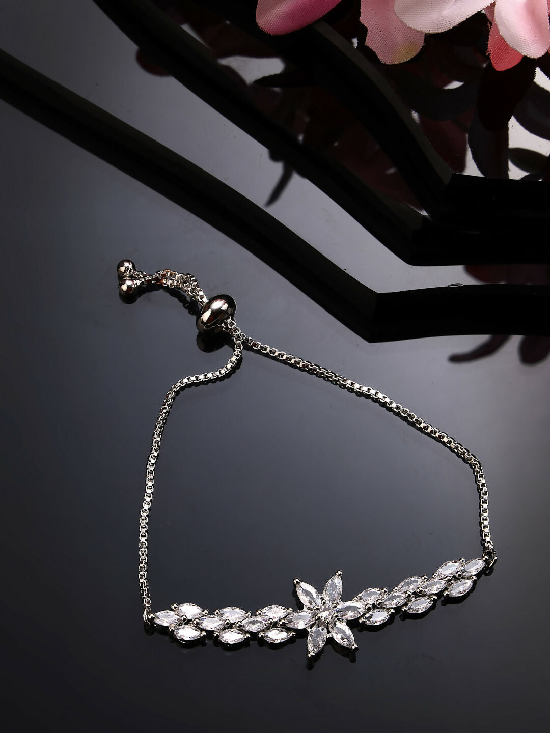 NVR Women Silver-Plated Handcrafted American Diamond Link Bracelet