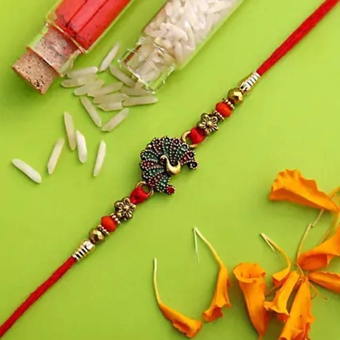 Beautiful Peacock Ethnic Rakhi & Cadbury Temptations | Grocsy