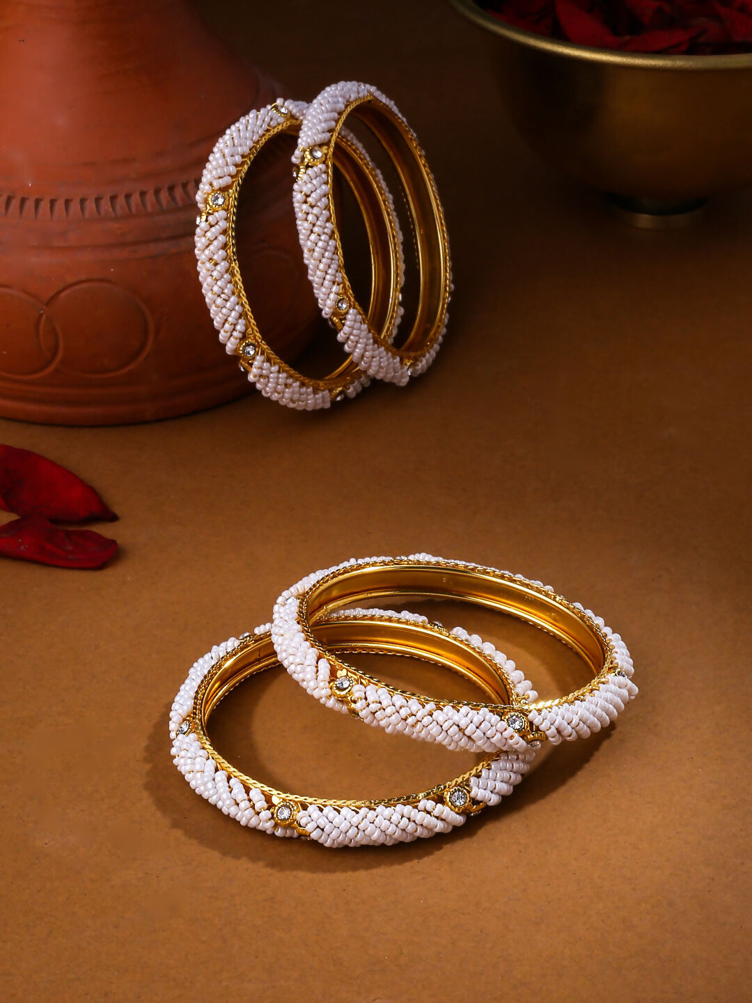 NVR Women Set of 4 Gold-Polished Traditional Pearls Beaded Bangles | Grocsy