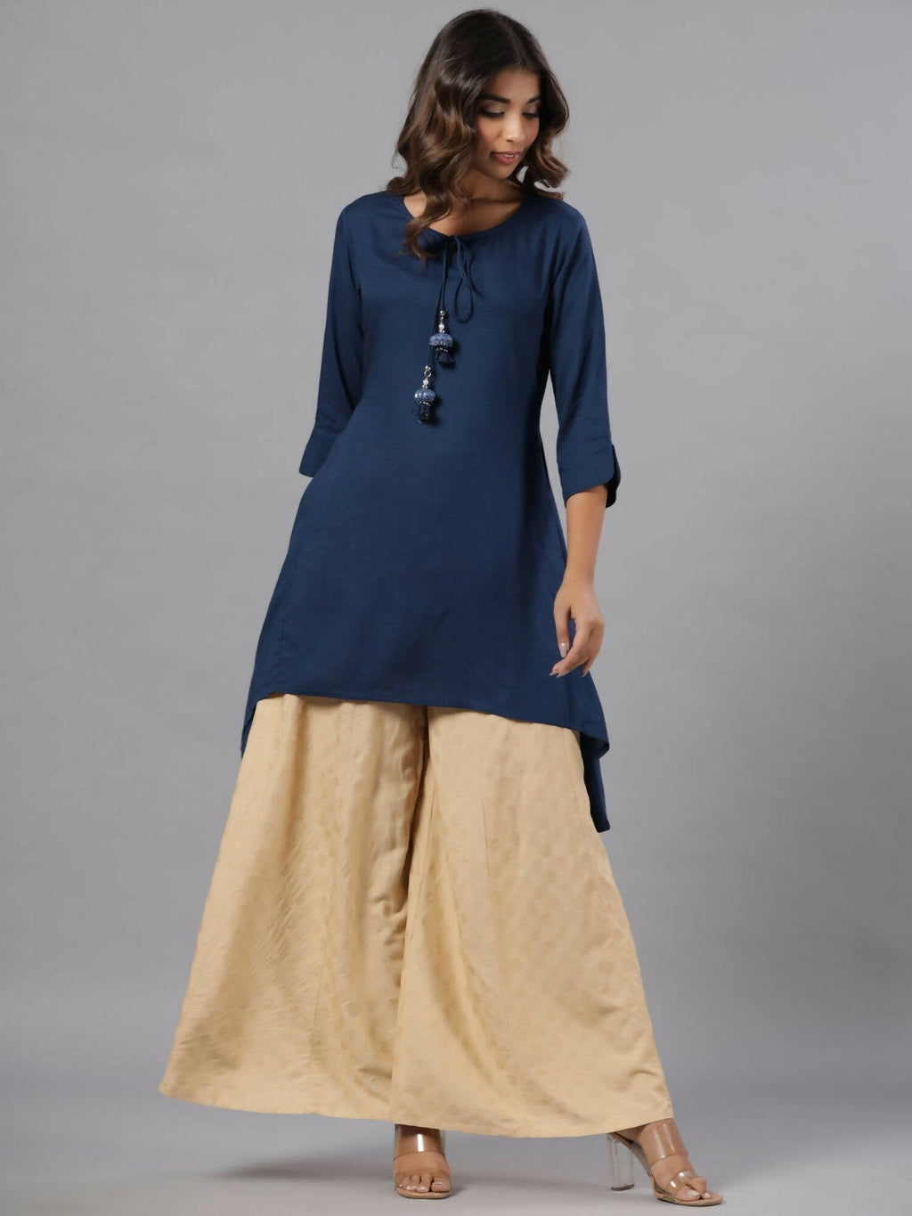Juniper Women Indigo Rayon Solid Asymmetric Kurta | Grocsy