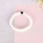 NVR Men & Women White & Black Marbel Crystal Elasticated Bracelet | Grocsy