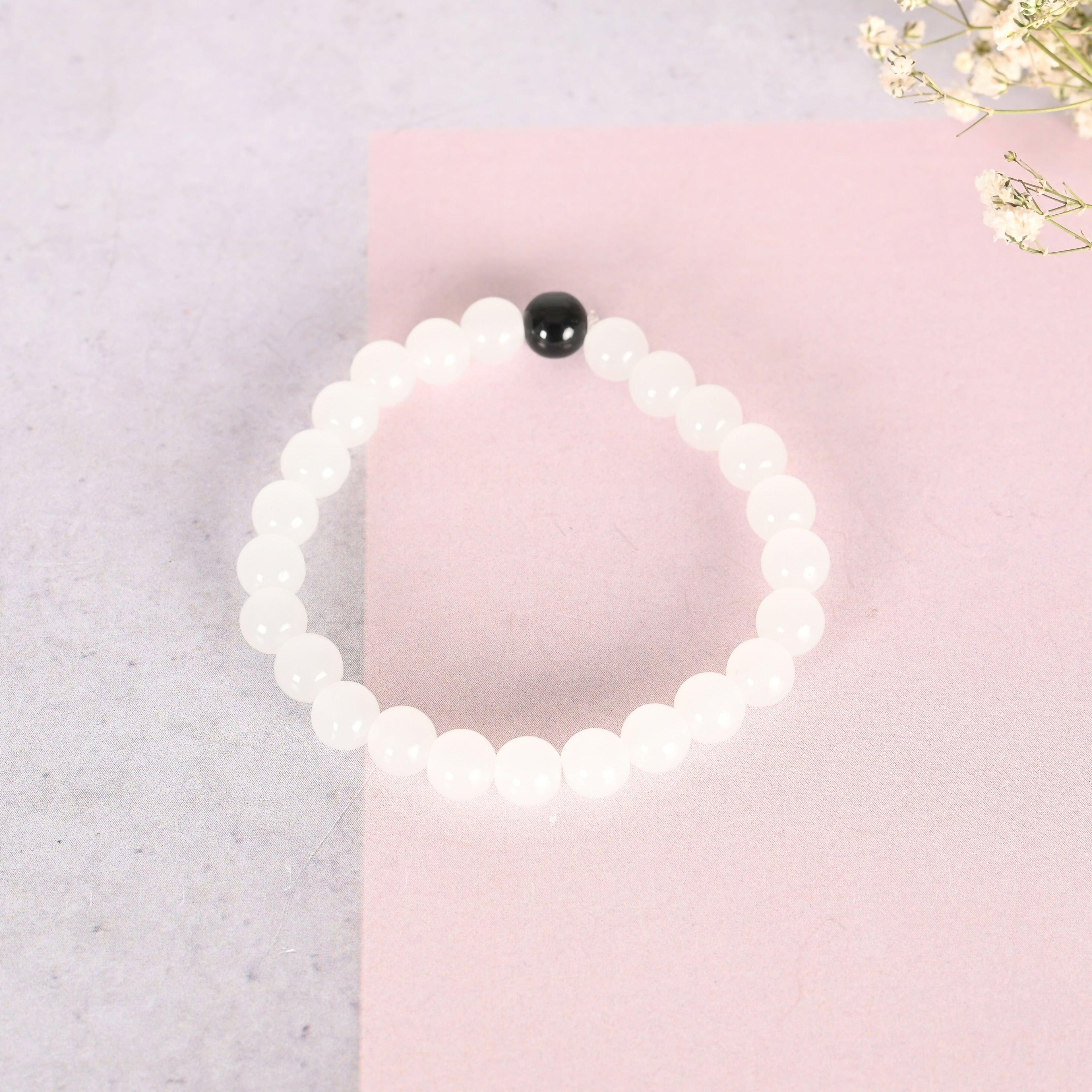 NVR Men & Women White & Black Marbel Crystal Elasticated Bracelet | Grocsy