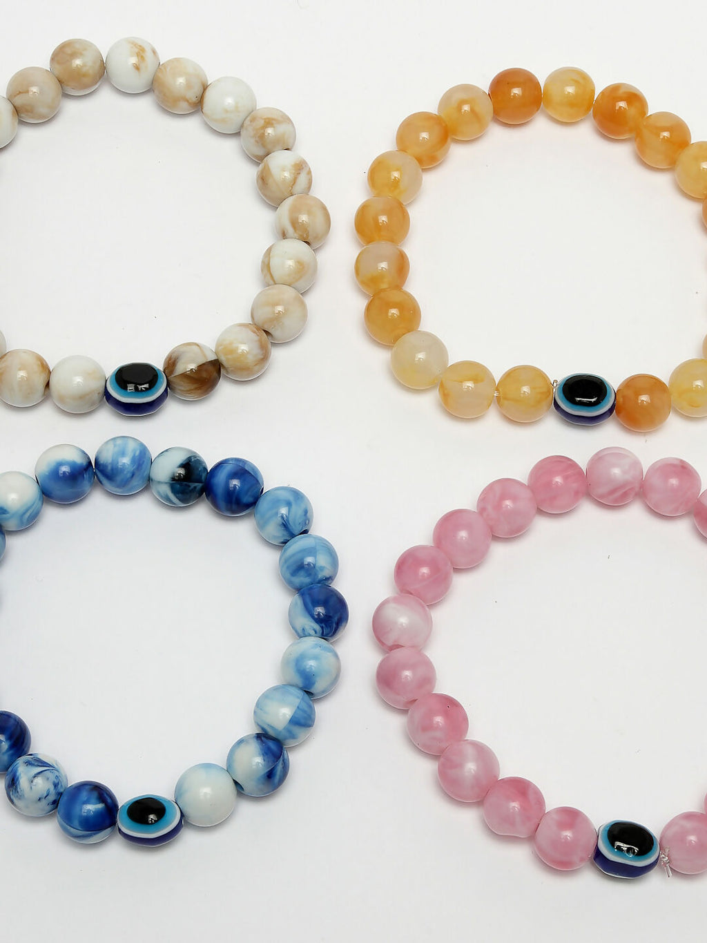 NVR Men & Women Set of 4 Artificial Beads-Beaded Evil Eye Elasticated Bracelet | Grocsy