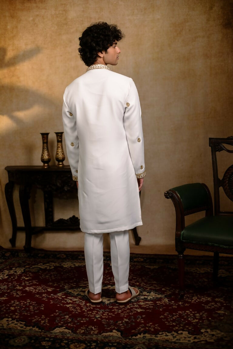 Falling Raw Silk White Devalaya Kurta By Hilo Design | Grocsy