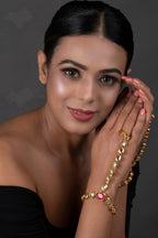 Peryl Women's Red Gold Toned Royal Kundan Hathphool - Swadesiicart