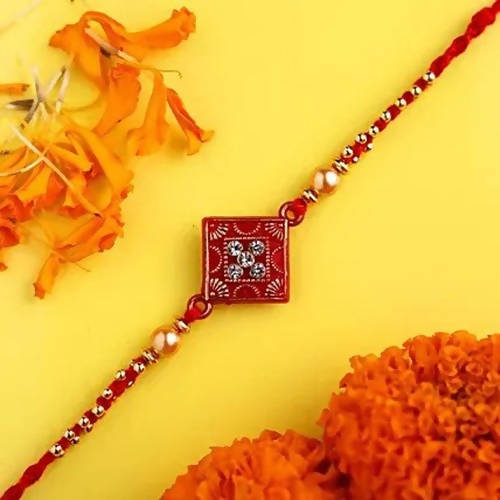 Sleek American Diamond Rakhi And Cashew Jar | Grocsy
