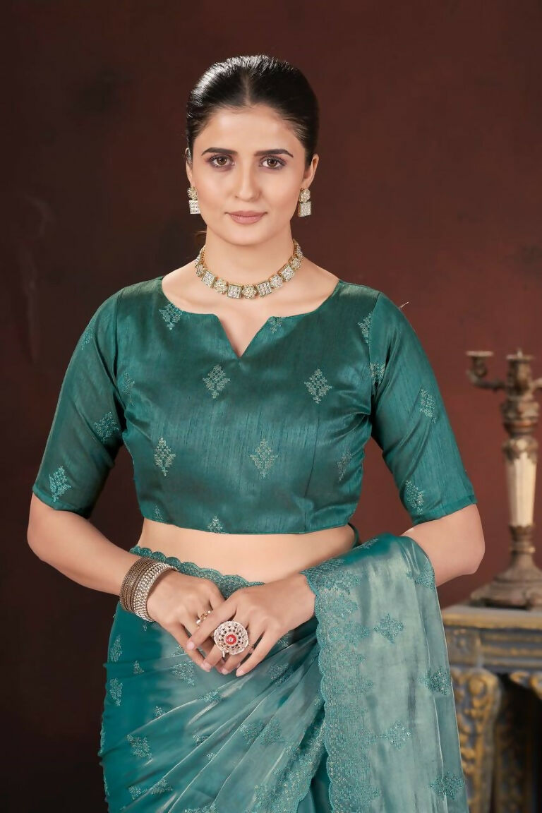 Vastranavya Teal Jimmy Choo Silk 3mm Sequence work with Cross Stitch Embroidery work & Cutwork Border Saree | Grocsy