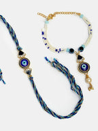 NVR Women & Men Set of 2 Blue Evil Eye Bhaiya Bhabhi Rakhi With Roli Chawal | Grocsy