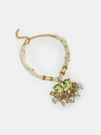 NVR Women & Men Set of 2 Green Lotus Shape Kundan-Studded & Beaded Handcrafted Wraparound Rakhi Set With Roli Chawal | Grocsy