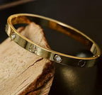 Jewel City Stainless Steel Gold-Plated Kada For Office Wear | Grocsy