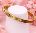 Jewel City Stainless Steel Gold-Plated Kada For Office Wear | Grocsy