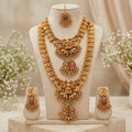 Jewel City South Indian Temple Jewelry Set: Lakshmi Long Haram, Choker, Earrings & Maang Tikka Bridal Set | Grocsy