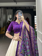 Lorenvalley Offwhite and Purple Tussar Silk Patola Print Lehenga Choli | Grocsy