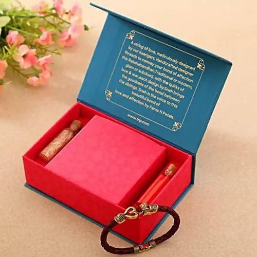 Om Golden Bracelet Rakhi & Kaju Rolls Box | Grocsy