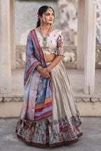 Vedant Vastram Fully Printed Pure Manipuri Silk Lehenga Choli With Blouse & Dupatta - Beige | Grocsy
