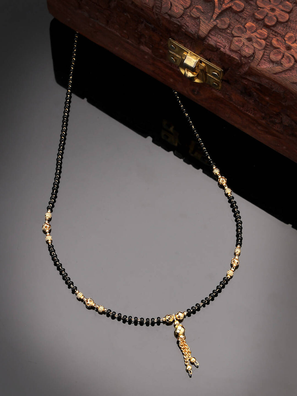 NVR Women Ethnic Gold-Polished Beaded Mangalsutra | Grocsy