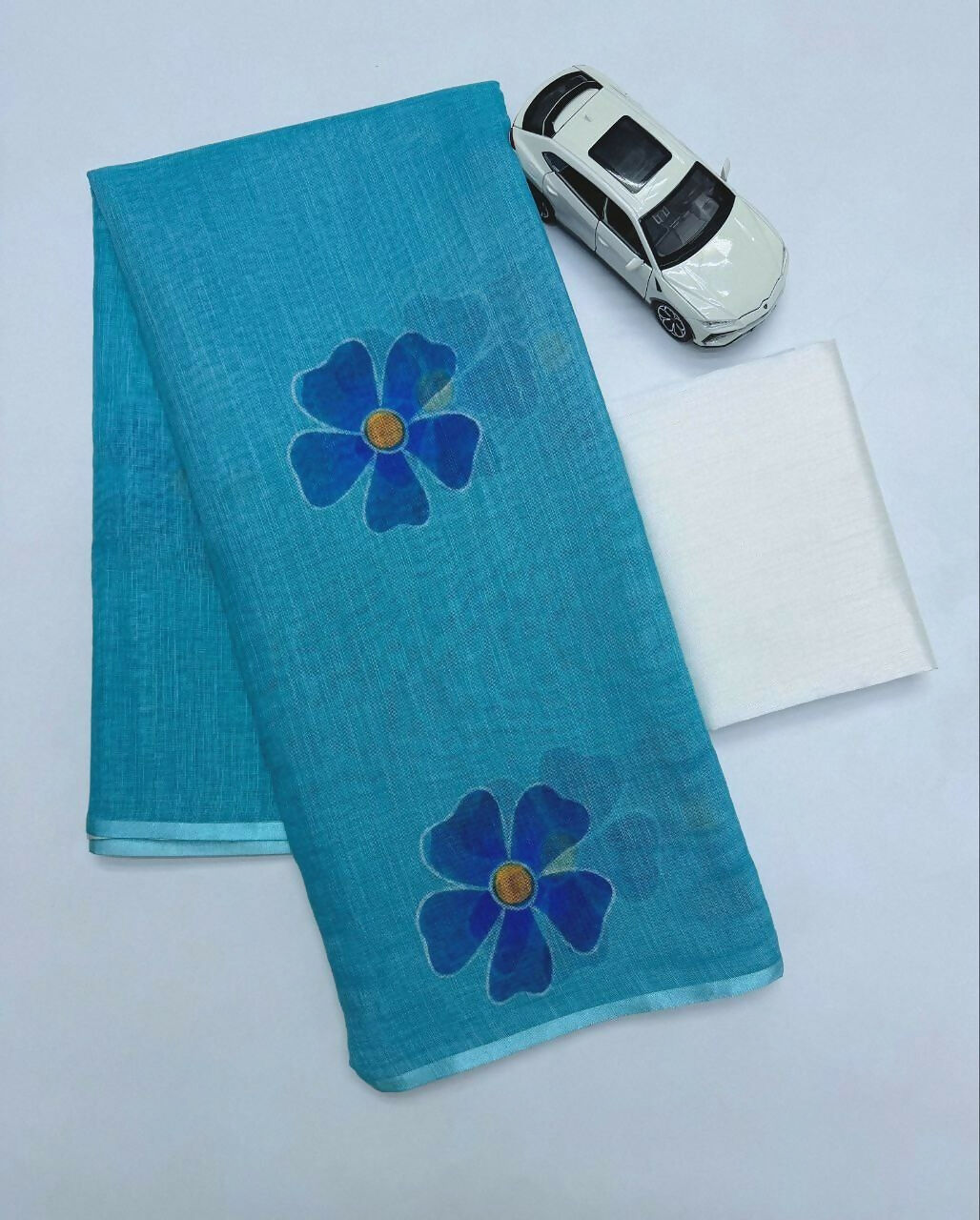 Prime Volt Women's Sky Blue Floral Digital Print Soft Linen Saree With Blouse | Grocsy