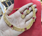 Jewel City Designer Gold Floral Necklace Set with Ruby Stones Elegant Matt Gold Finish Jewelry Set for Women | Grocsy