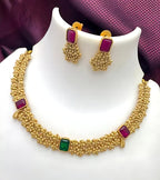 Jewel City Designer Gold Floral Necklace Set with Ruby Green Stones Elegant Matt Gold Finish Jewelry Set for Women | Grocsy