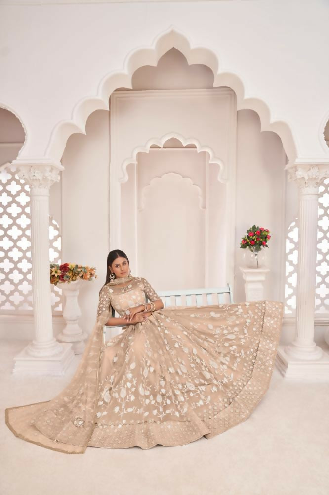 Aastha Fashion Dusty Chiku Butterfly Net White Cotton Thread Work, Zari Work And Sandwich Sequence Work Embroidery Wedding Wear Lehenga Choli | Grocsy