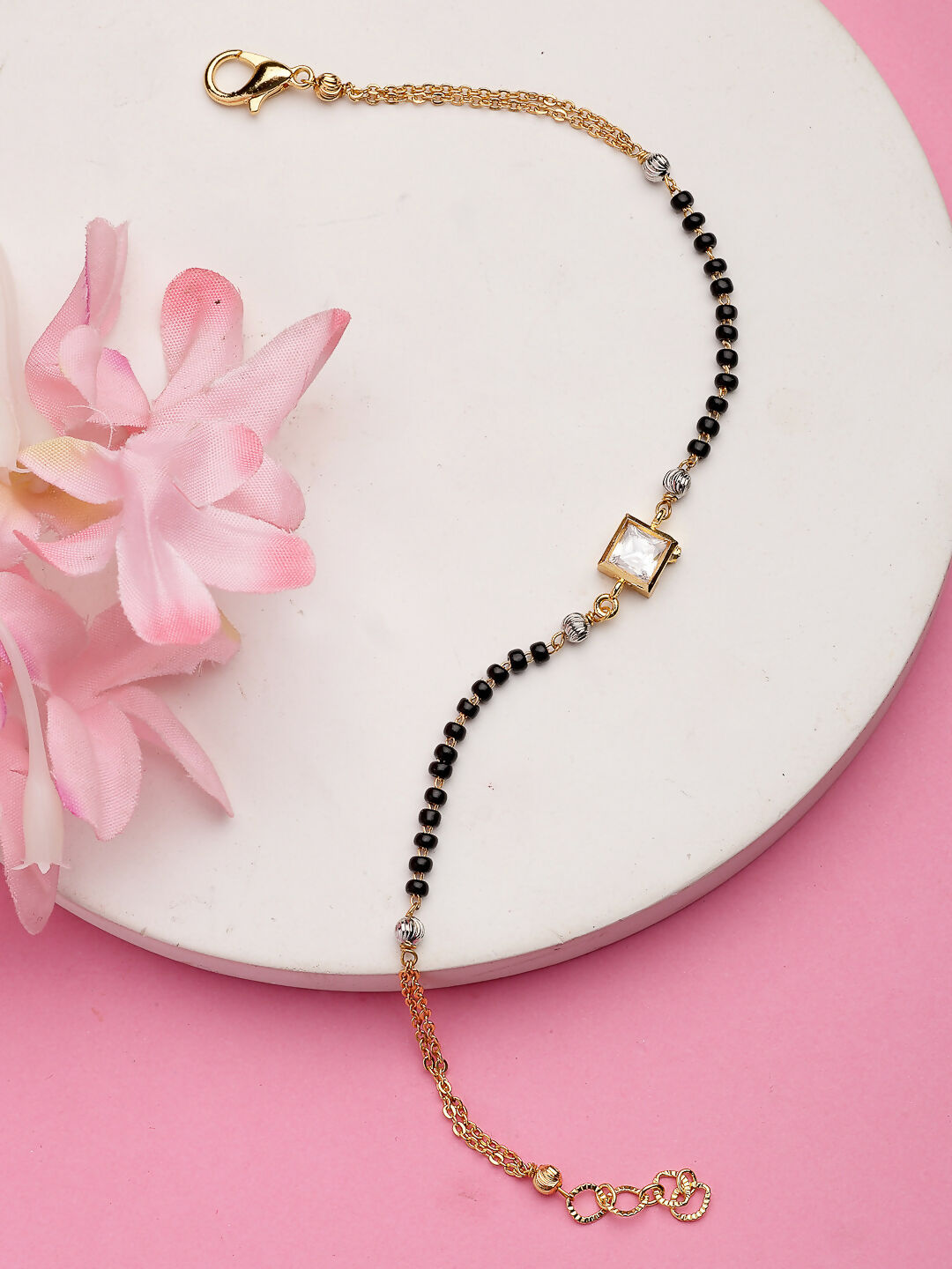 NVR Women Gold-Polished & Black Brass Stone-Studded Hand Mangalsutra Link Bracelet | Grocsy