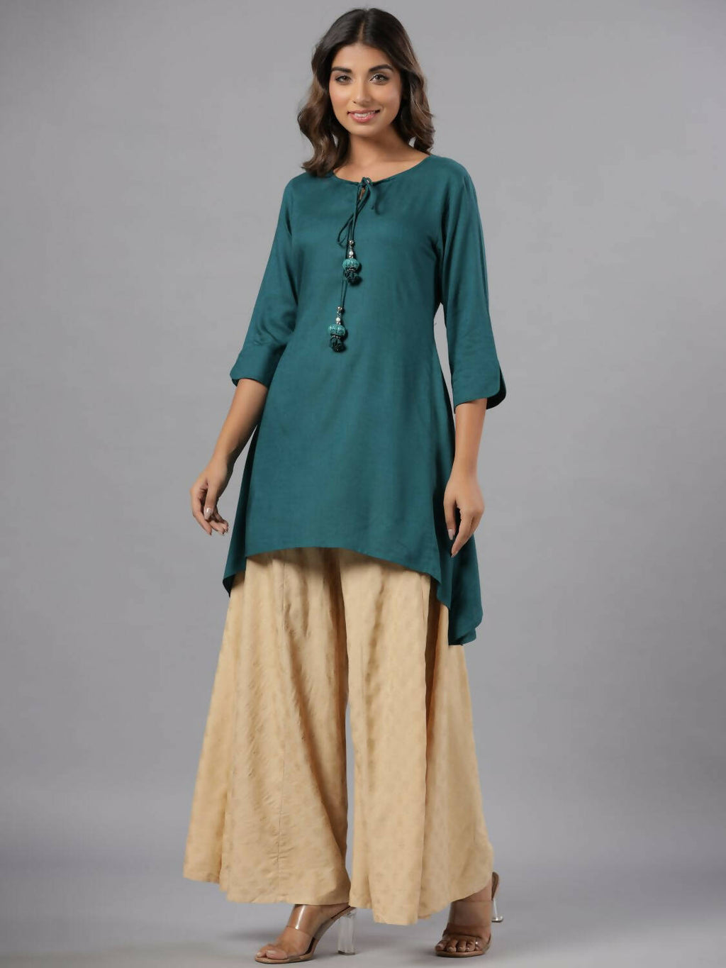 Juniper Women Teal Rayon Solid Asymmetric Kurta | Grocsy