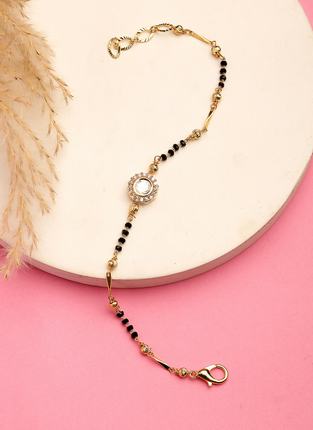 NVR Women Gold-Polished & Black Brass AD-Studded Hand Mangalsutra Link Bracelet