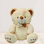 Webby Plush Cute Sitting Teddy Bear Soft Toys with Neck Bow and Foot Print (Beige) | Grocsy