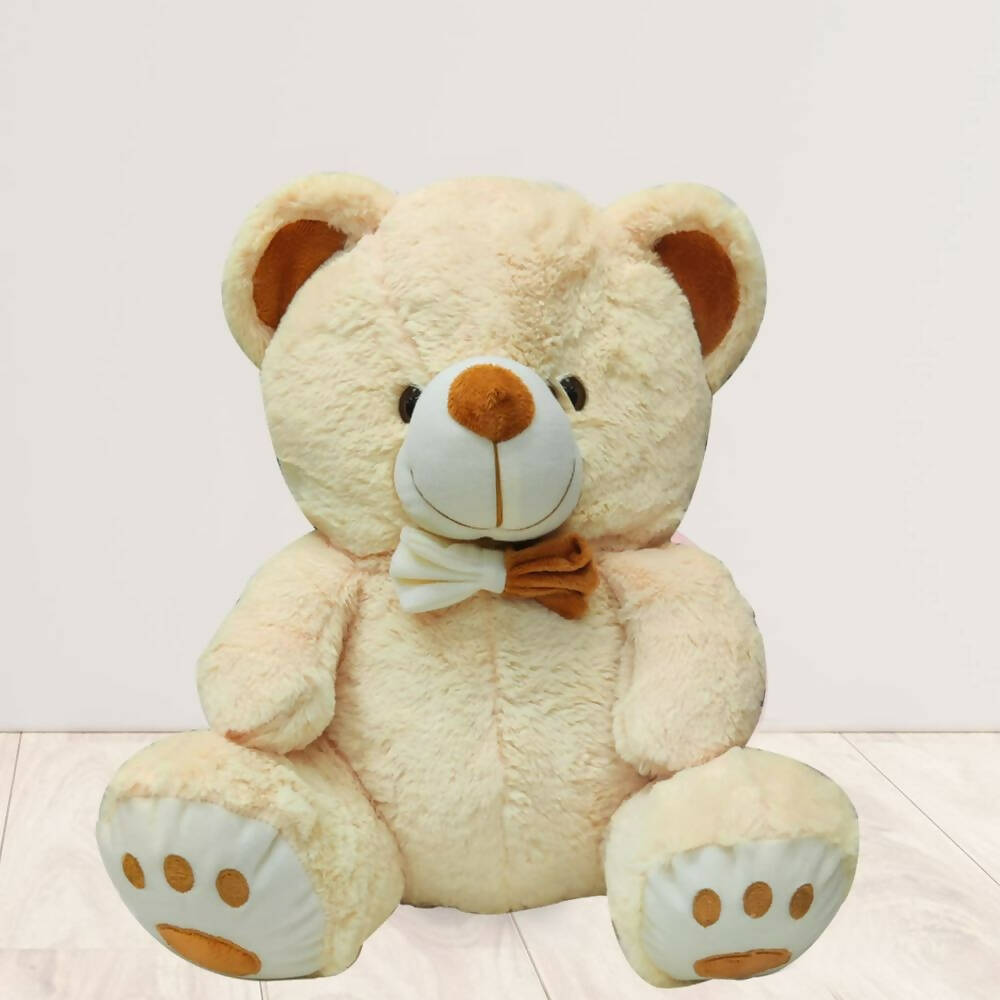 Webby Plush Cute Sitting Teddy Bear Soft Toys with Neck Bow and Foot Print (Beige) | Grocsy