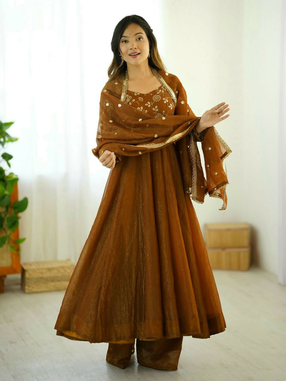Teeya Creation New Trendy Stylish Elegant Finish With Full Flair Gold Gown Set | Grocsy