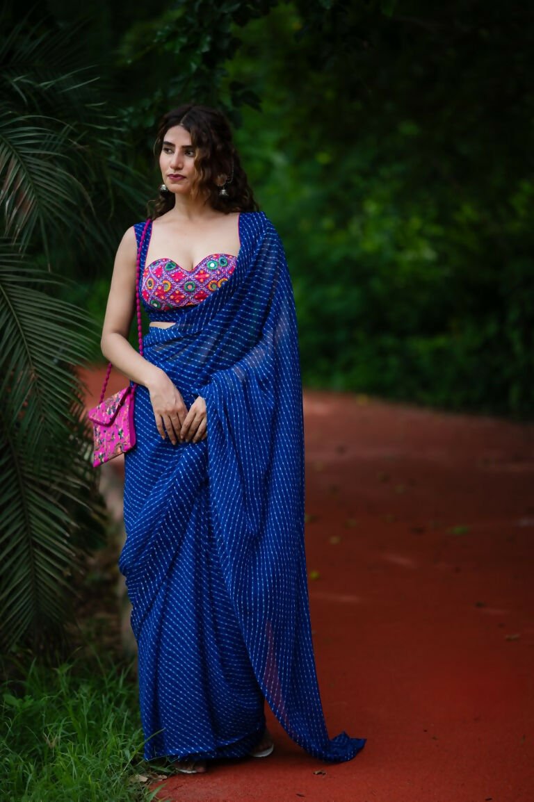 Amodini Designer Studio Women's Blue Chinon Lehriya Sleeveless Blouse | Grocsy